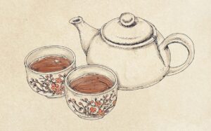 Teekanne und zwei Tassen